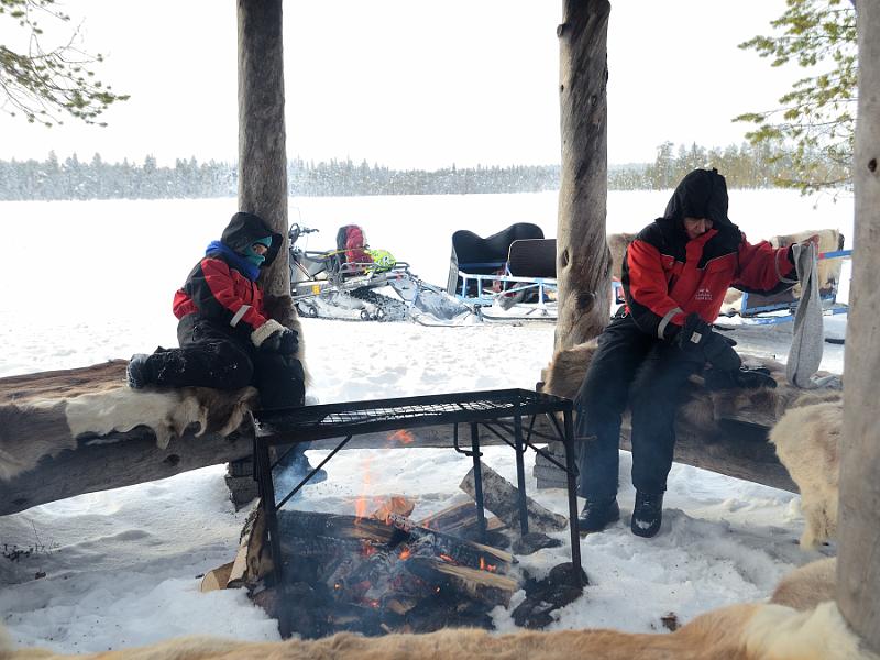 Finland0118.jpg - Ice fishing on a frozen lake in Lapland