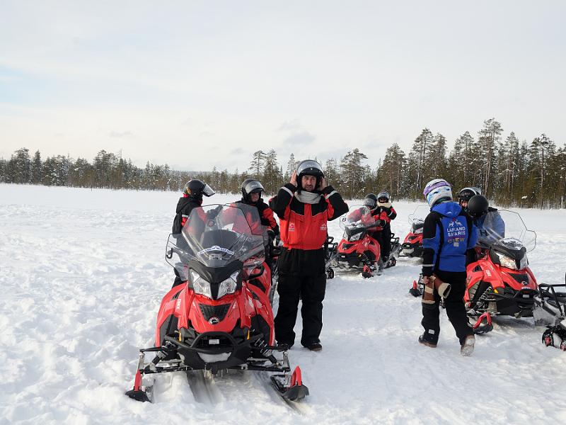 Finland0120.jpg - Ice fishing on a frozen lake in Lapland