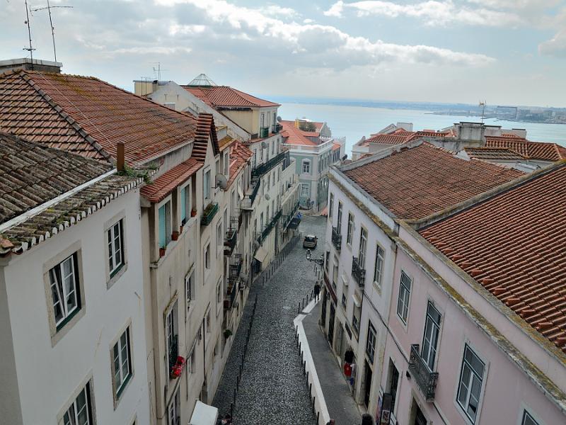 portugal017.jpg -  View from the top of entrance to St. George Castle on a street 