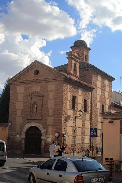spain0089.JPG - White storks nest on a building Alcala de Henares