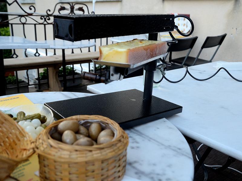 switz206.jpg - Traditional swiss raclette cheese with potatoes and pickles