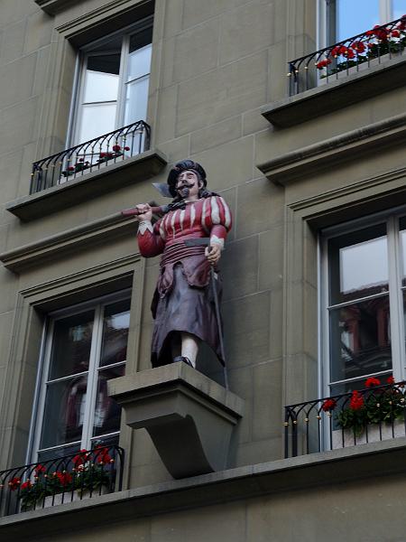 switz251.jpg - Butcher statue on a building  in Kramgasse Street in Bern